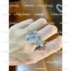 van cleef & arpels diamond pave two motif flower ring